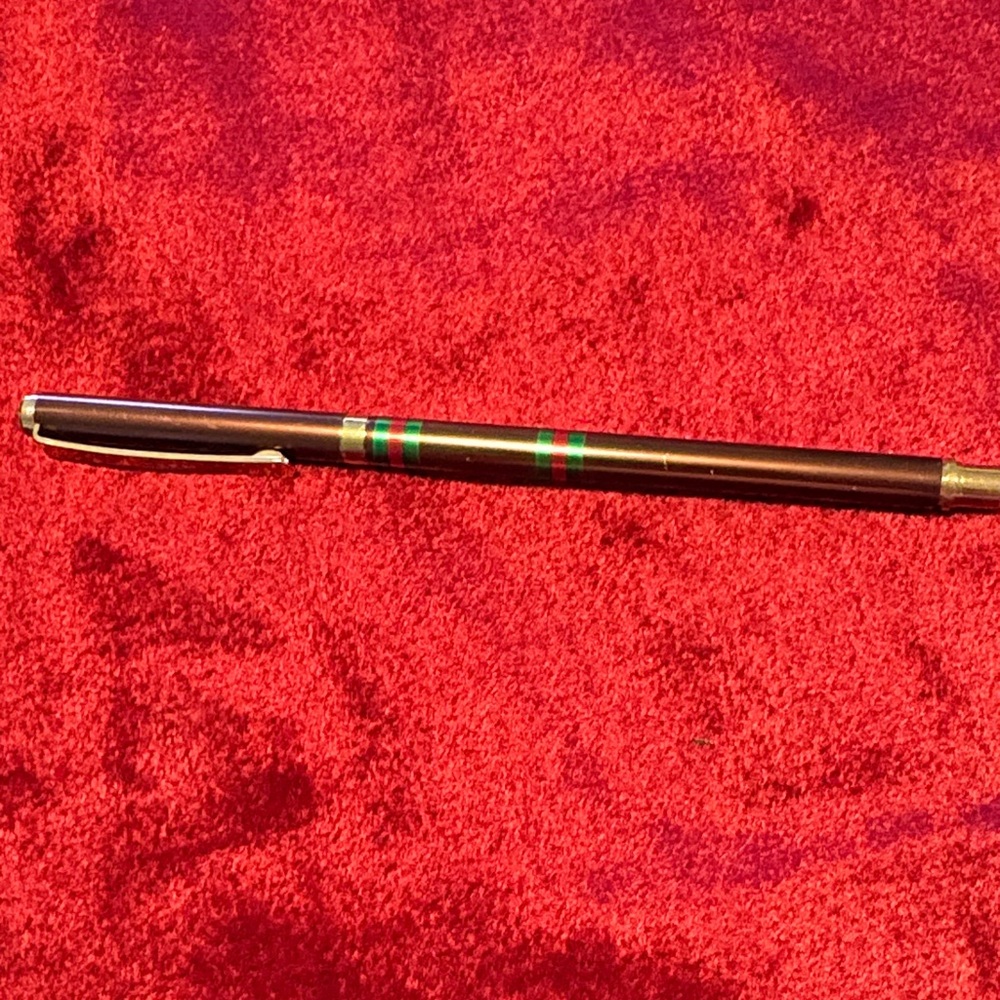 Elegant Black and Gold Gucci Pen with Green Accents from Italy vintage
